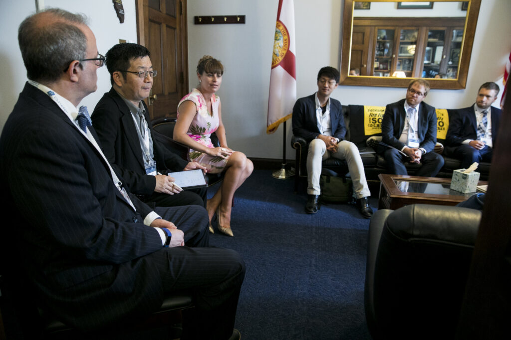 Olga Mack discussing security and privacy for transformative and disruptive technologies on Capitol Hill.