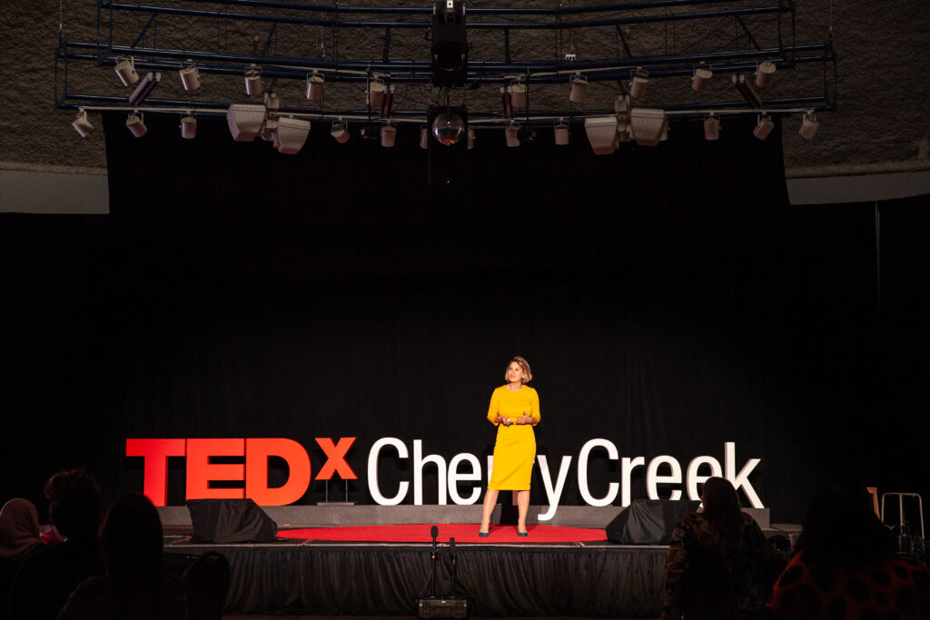 Olga Mack speaking at TEDxCherryCreek about law being accessible and serving all.