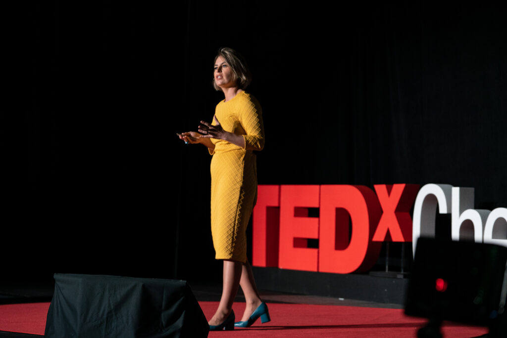 Olga Mack speaking at TEDxCherryCreek about the importance of law serving society.