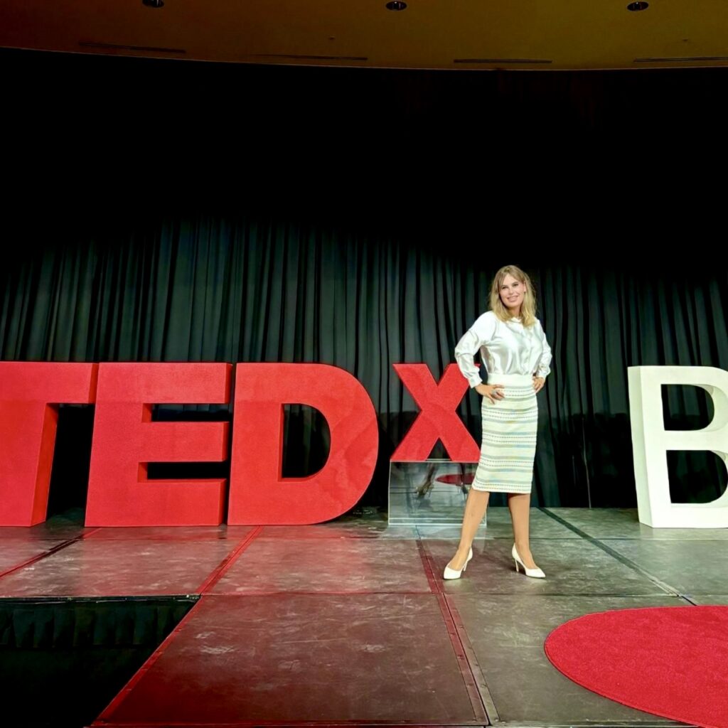 Olga Mack speaking at TEDxBGSU about supervising AI with a manual and a checklist.